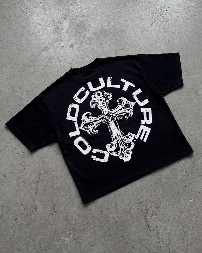DISCHARGE TEE BLACK - black oversized graphic tee, flat lay - Cold Culture