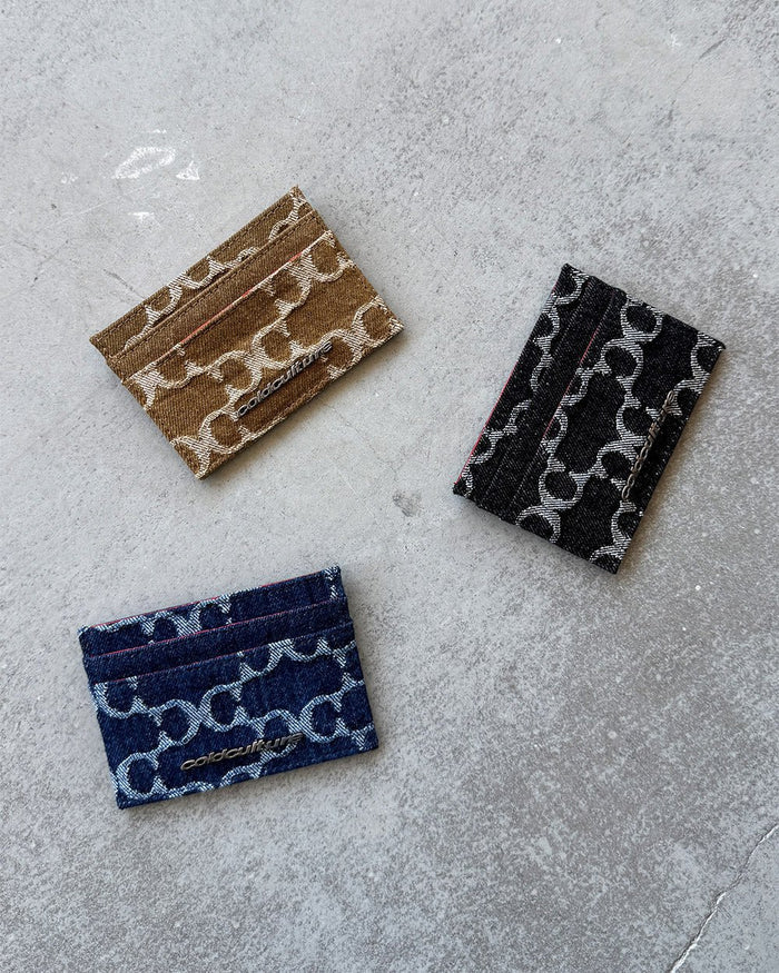 FEVER CARD HOLDER BLACK - black monogram wallet, flat lay with matching pieces - Cold Culture