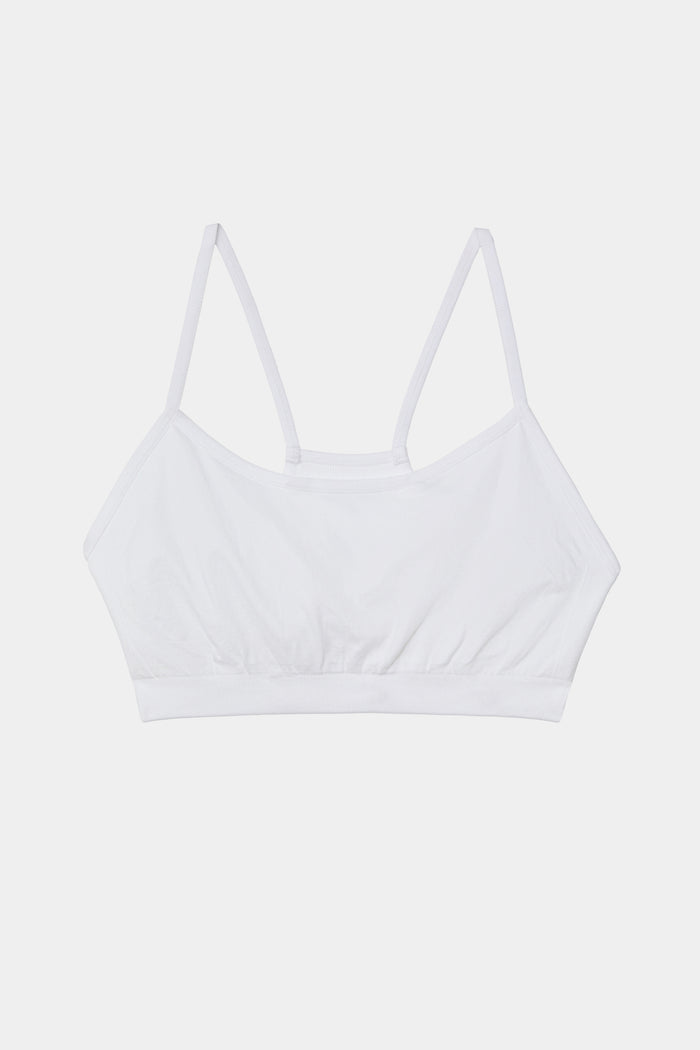 A Loren Seamless Bra - White on a white background.