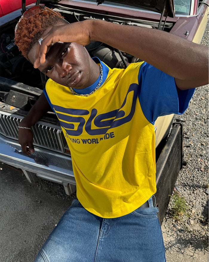 TEEN SPIRIT ERA TEE YELLOW AND BLUE - yellow and blue graphic print tee, street style shot - Cold Culture