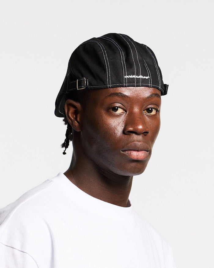 BONET BLACK - black contrast stitch flat cap, on model close-up - Cold Culture #man