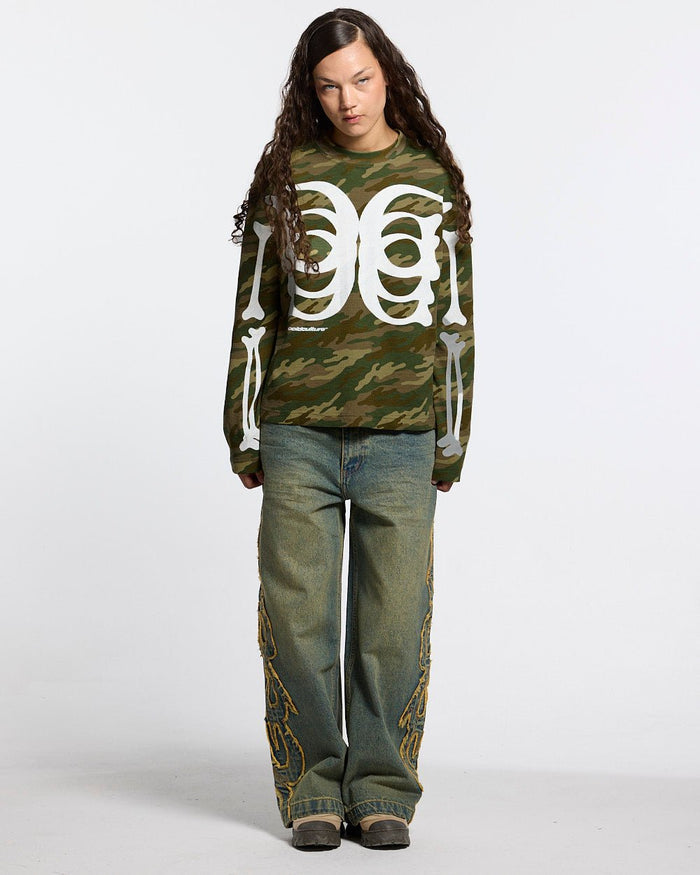 BONEY LONGSLEEVE CAMO - camo skeleton print longsleeve tee, front view on female model - Cold Culture #woman