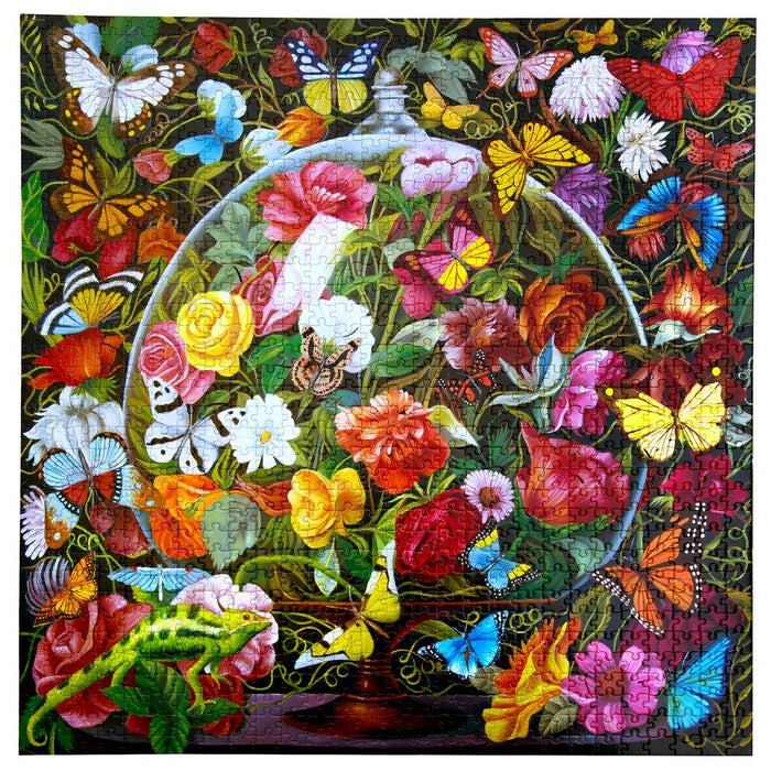 Colorful embroidery of flowers, butterflies, and a frog in a garden setting.