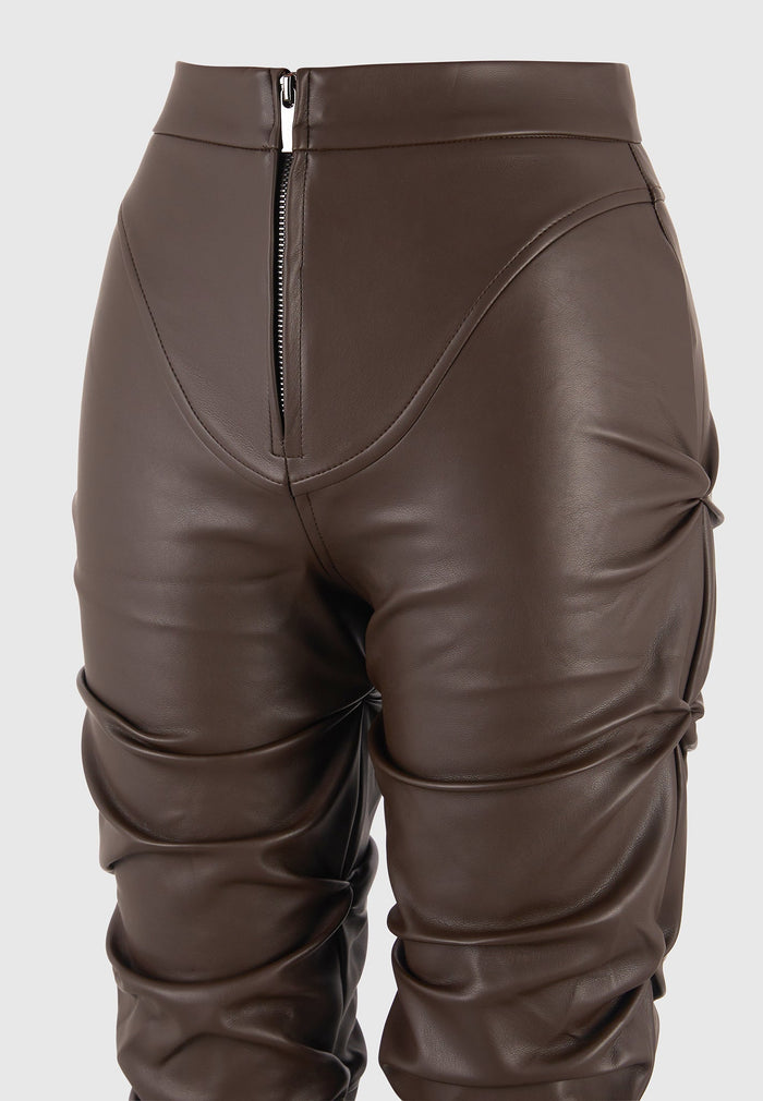 tacked-vegan-leather-flared-trousers-brown