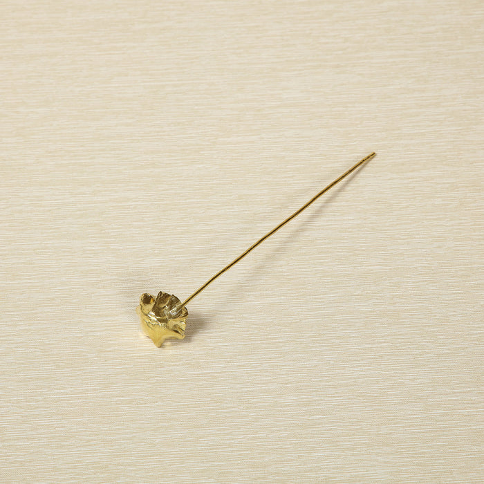 Cast brass cocktail spoon