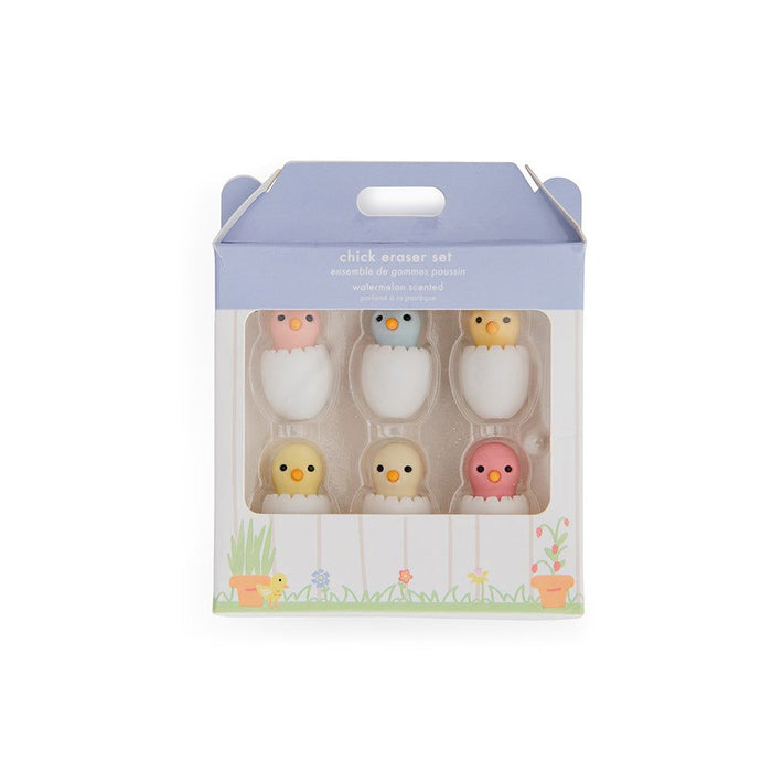 Set of chick erasers in packaging on a white background