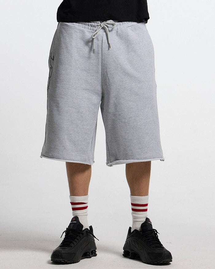 COLD SPORT SWEATPANTS GREY - grey baggy sweat shorts, front view on male model - Cold Culture #man