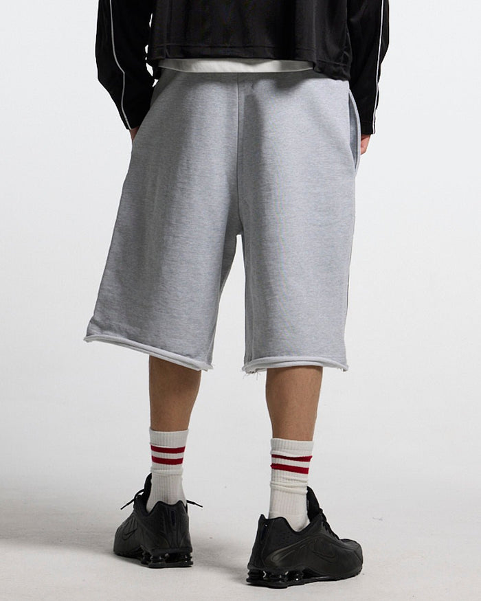 COLD SPORT SWEATPANTS GREY - grey baggy sweat shorts, back view on male model - Cold Culture #man