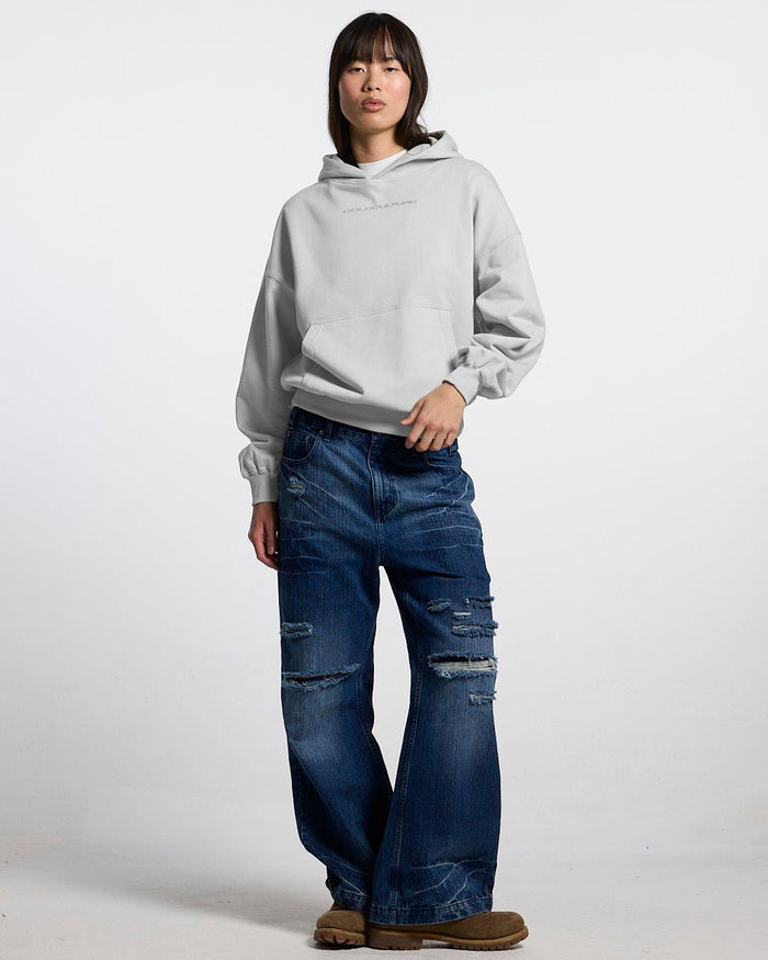 COSMOS ARC HOODIE LIGHT GREY - light grey oversized hoodie, front view on female model - Cold Culture #woman