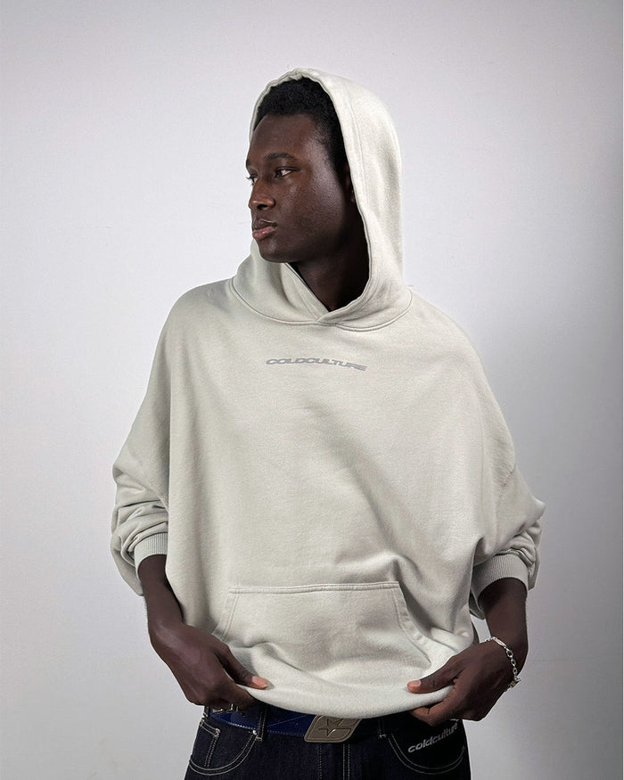 COSMOS ARC HOODIE LIGHT GREY - light grey oversized hoodie, front view on male model - Cold Culture