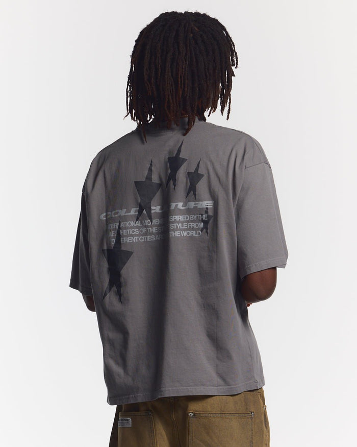 COSMOS ARC TEE SMOKEY GREY - washed grey oversized tee, back view on male model - Cold Culture #man