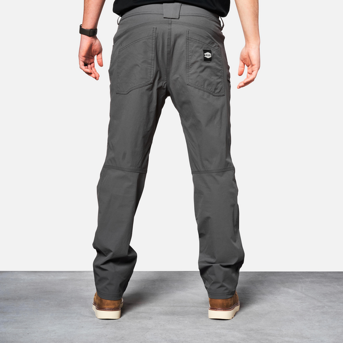 Back of BRUNT water-resistant lightweight breathable costello work pant in charcoal