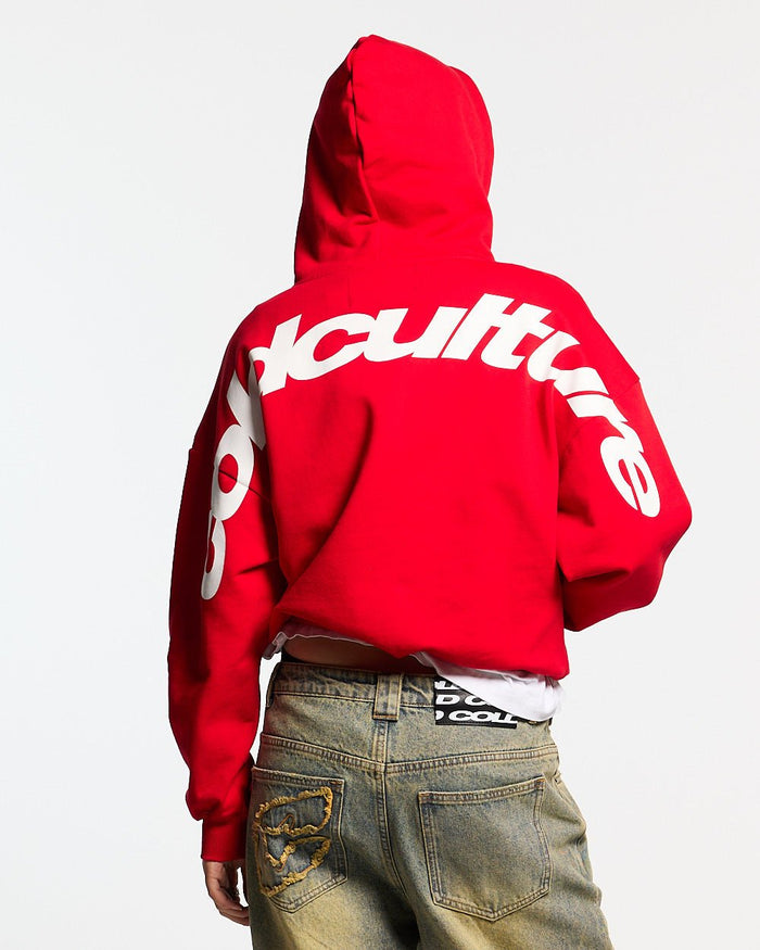 CURVED HOODIE RED - red oversized hoodie, back view on female model - Cold Culture #woman