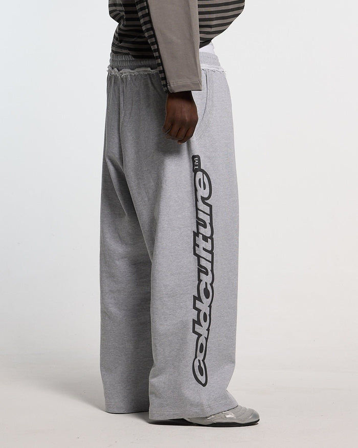 DAILY SET SWEATPANT GREY MELANGE - grey melange sweatpants, back view on male model - Cold Culture #man