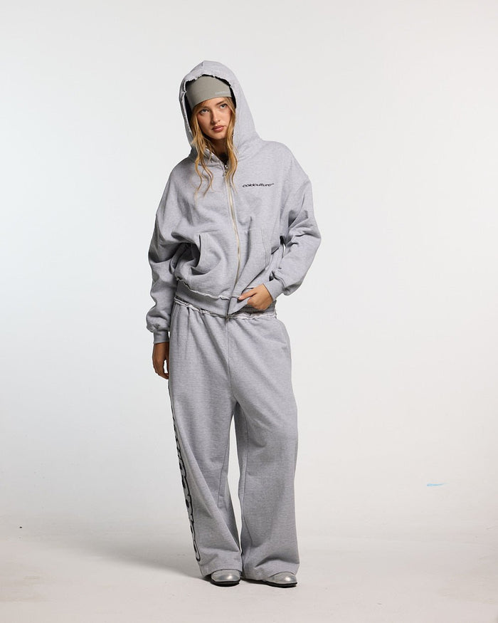 DAILY SET SWEATPANT GREY MELANGE - grey melange sweatpants, front view on female model - Cold Culture #woman