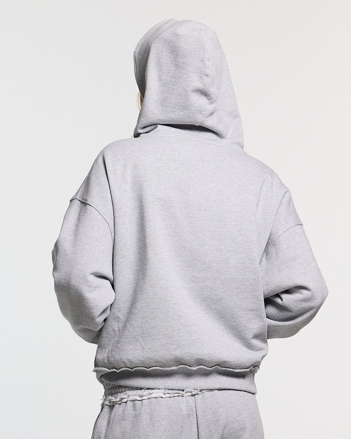 DAILY SET ZIP UP GREY MELANGE - grey melange zip-up hoodie, back view on female model - Cold Culture #woman