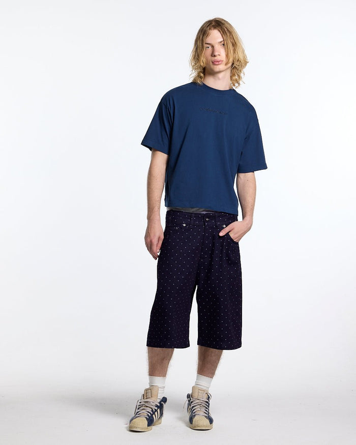 DISTRESS CURVED TEE NAVY - navy blue boxy tee, front view on male model - Cold Culture