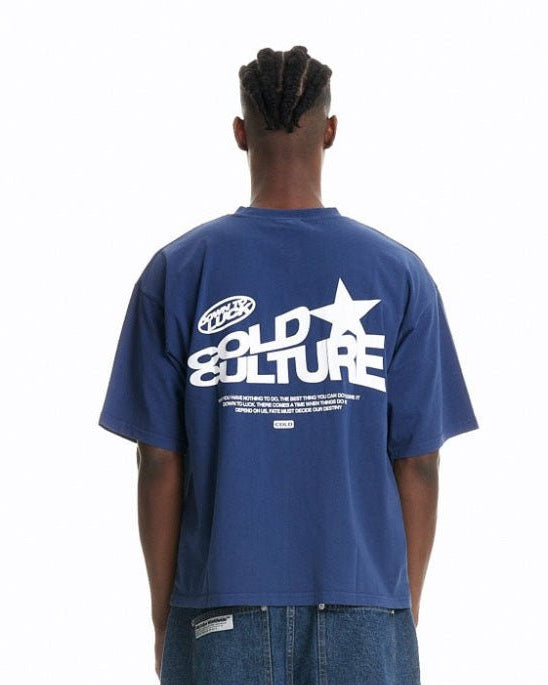 DOWN TO LUCK TEE BRIGHT BLUE - bright blue oversized tee, back view on male model - Cold Culture #man