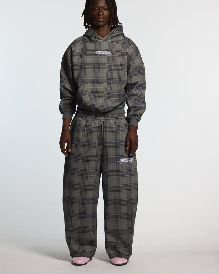 DRIFT SWEATPANTS GREY MIX - grey plaid sweatpants, front view on male model - Cold Culture #man