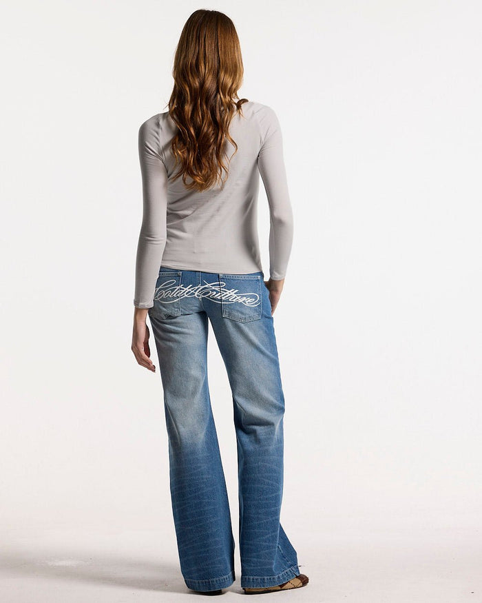 ESSENTIAL LONGSLEEVE TEE GREY - grey women's longsleeve tee, back view on female model - Cold Culture #woman