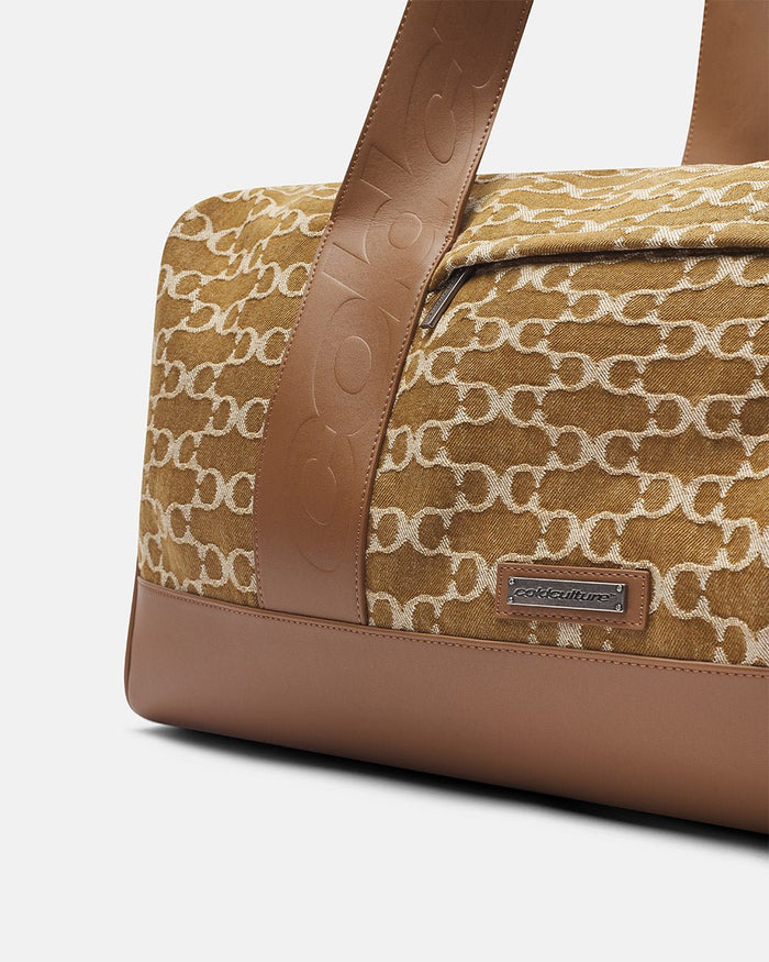 FEVER BAG BROWN - brown monogram duffle bag, detail close-up - Cold Culture