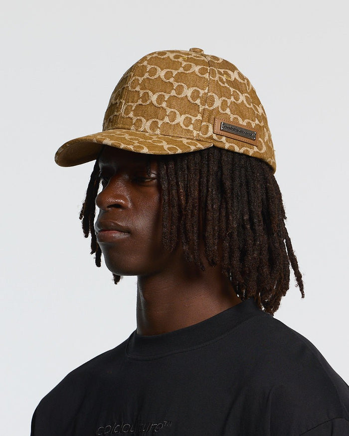 FEVER CAP BROWN - brown monogram cap, on model close-up - Cold Culture #man