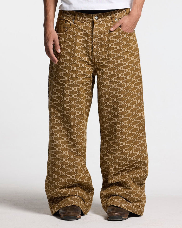 FEVER PANTS V3 BROWN - brown monogram denim pants, front view on male model - Cold Culture #man