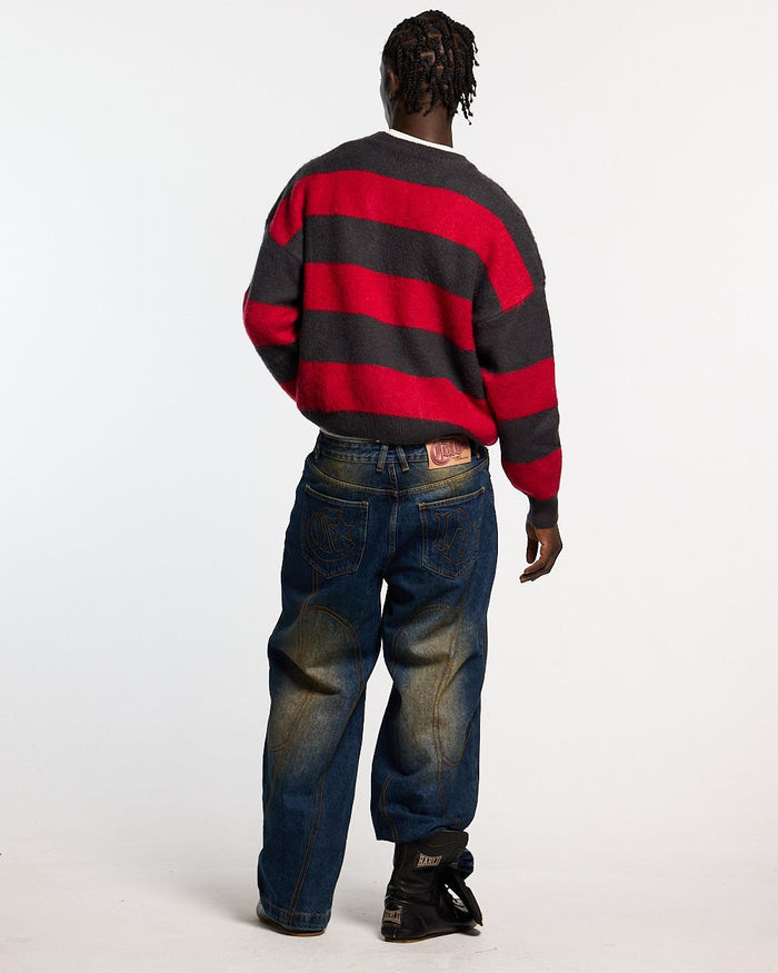 FLUFFY FUR KNIT BLACK & RED - black and red striped knit sweater, back view on male model - Cold Culture #man