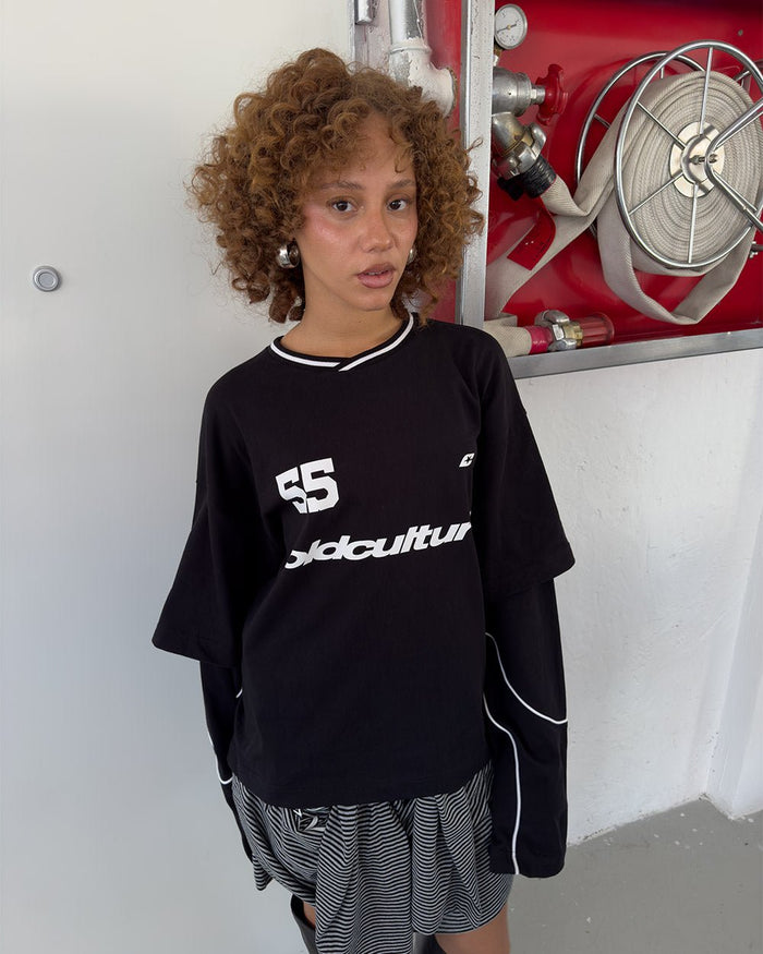 GAME ON LONGSLEEVE BLACK - black graphic print longsleeve tee, front view on female model - Cold Culture