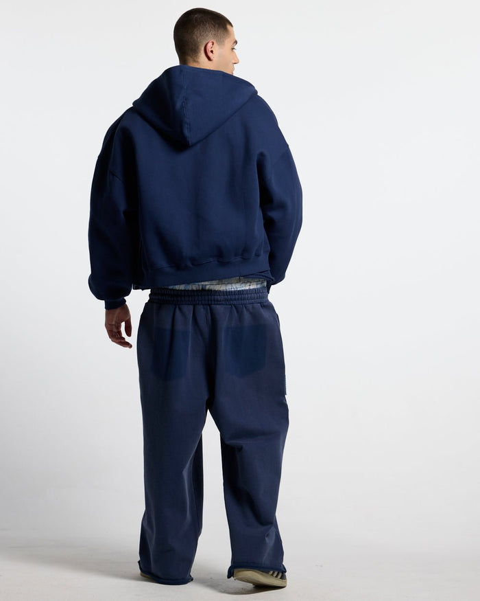 HIDE AND SEEK SWEATPANTS NAVY - navy double waistband sweatpants, back view on male model - Cold Culture #man