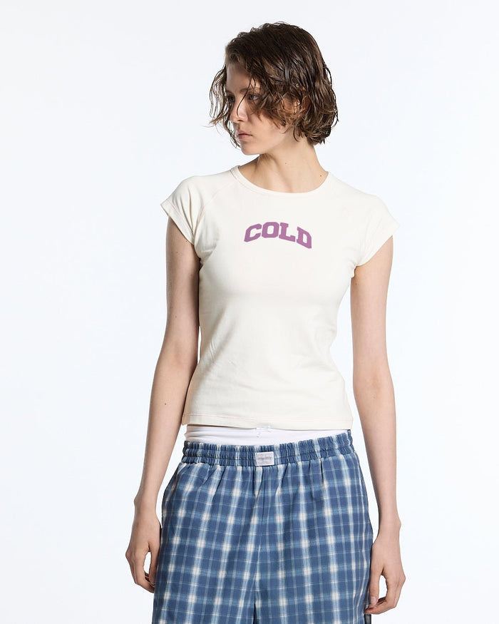 LITTLE BABY TEE WHITE - off-white graphic baby tee, front view on female model - Cold Culture