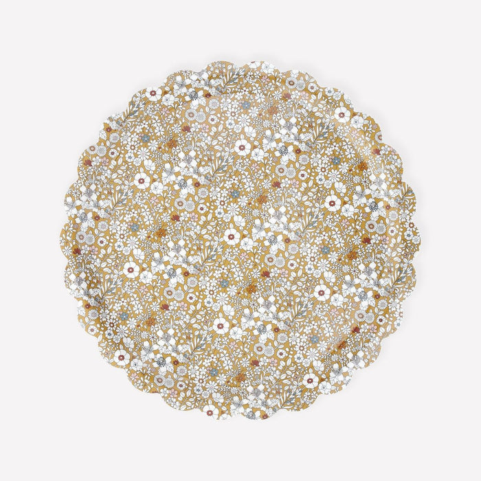 Circular pattern of small flowers on a white background