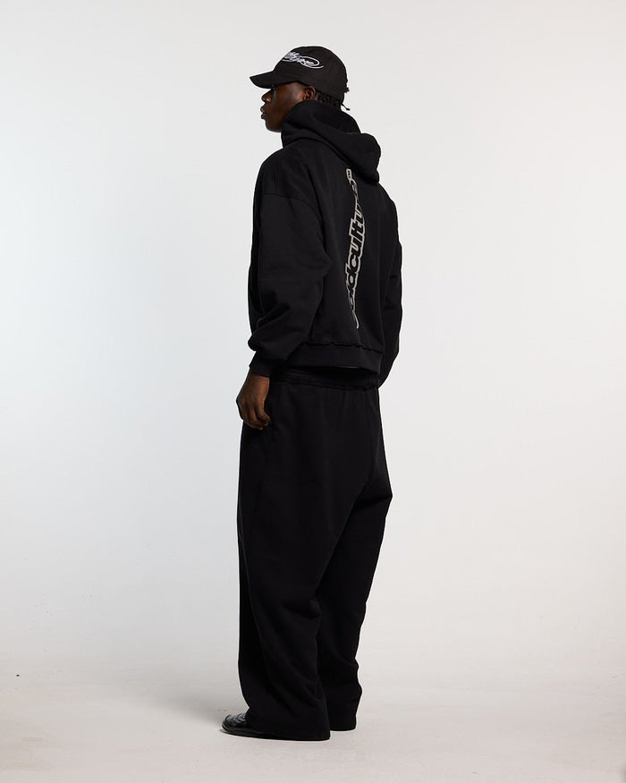 MIDNIGHT SET SWEATPANT BLACK - black logo print sweatpants, side view - Cold Culture #man