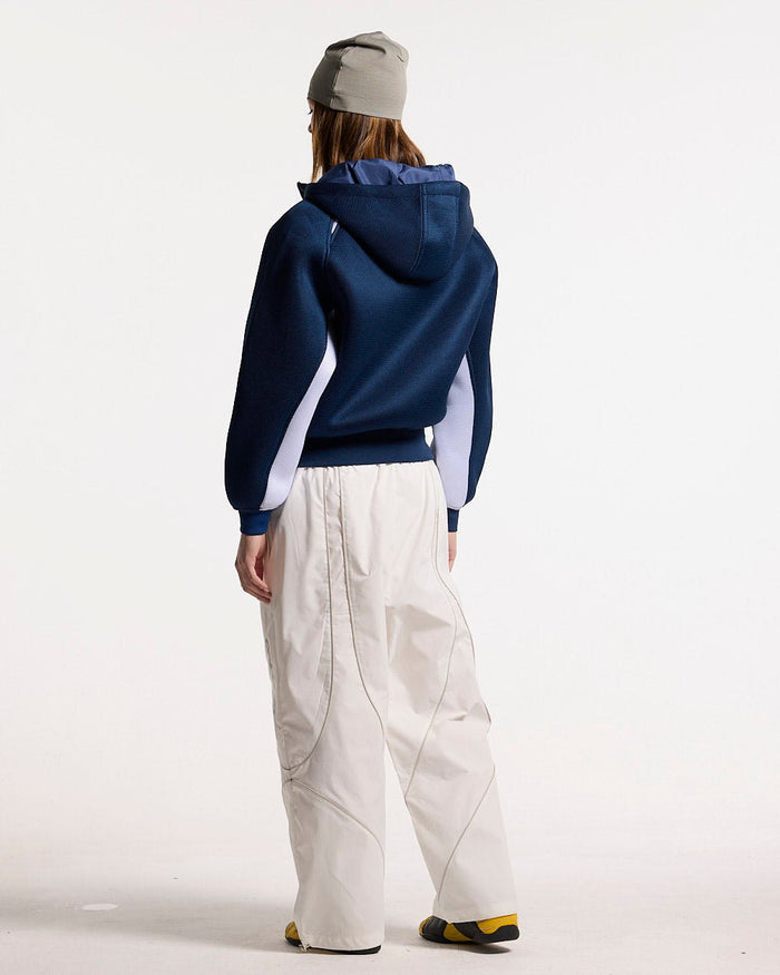 NEO ZIP JACKET WHITE & BLUE - navy and white zip jacket, back view on female model - Cold Culture #woman