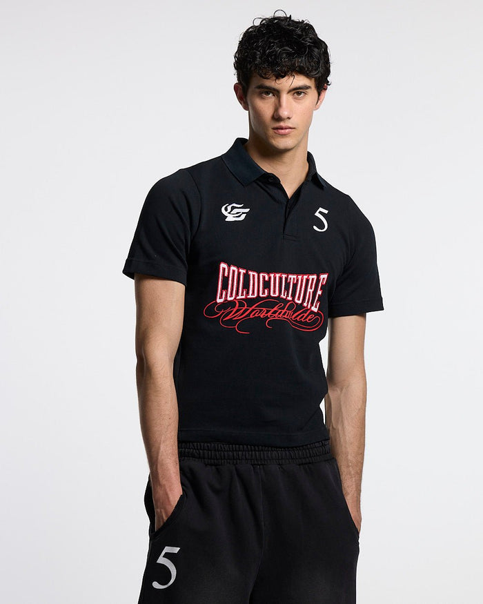 NIA SET POLO BLACK - black graphic print polo shirt, front view on male model - Cold Culture #man