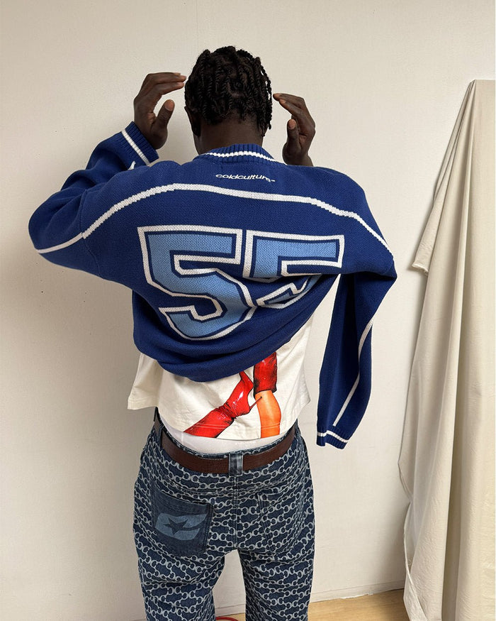 ROLLER KNIT BLUE - blue varsity knit sweater, back view on male model - Cold Culture