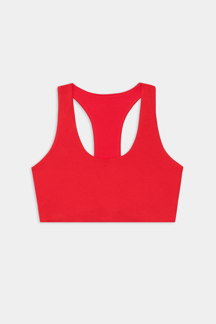 The SPLITS59 Sara Airweight Bra in Pirate Red is shown flat on a white background—ideal for Pilates or hot yoga.
