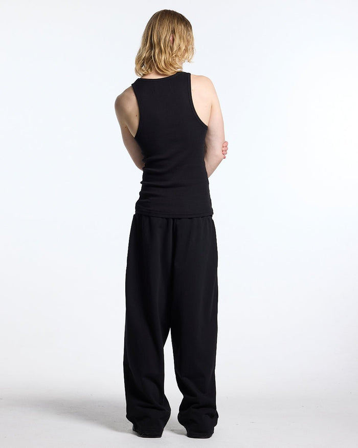SCRIPT TANK TOP BLACK - black ribbed tank top, back view on male model - Cold Culture
