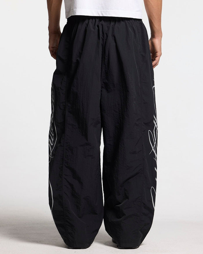 SCRIPT TECH PANTS BLACK - black script print sweatpants, worn detail - Cold Culture