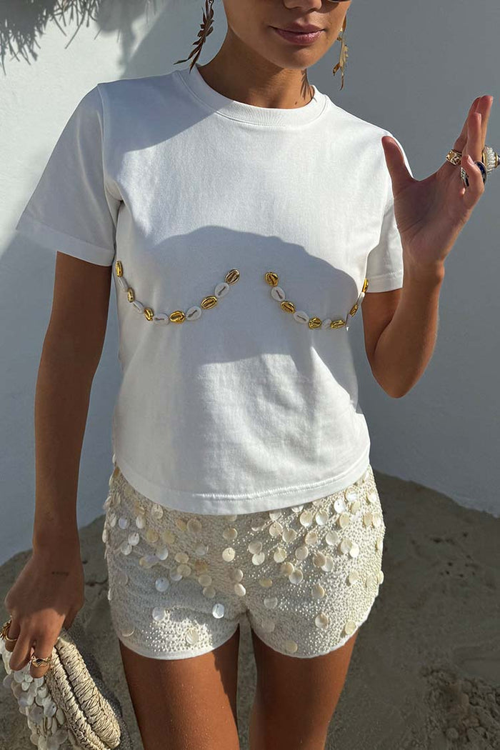 Cream Shells Hot Pants with pearlescent shell beads and a matching tee, designed in London for vacation.