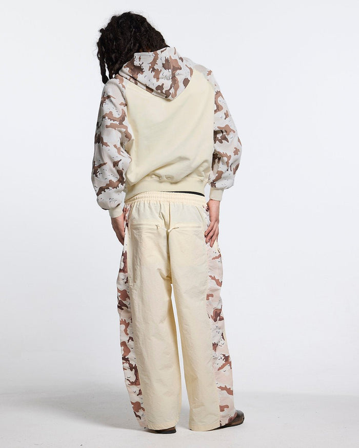 SPIDER PANTS BEIGE & CAMO - beige camo panel sweatpants, back view on male model - Cold Culture #man