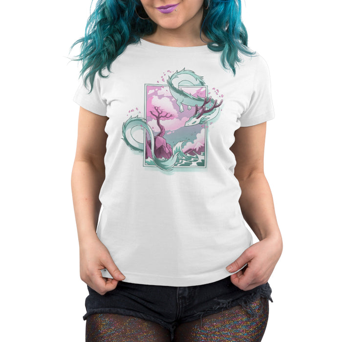 Premium Cotton T-shirt_TeeTurtle white Spring Blossom Dragon apparel featuring an artistic dragon surrounding a painting of a cherry blossom tree on a cliff next to the ocean.