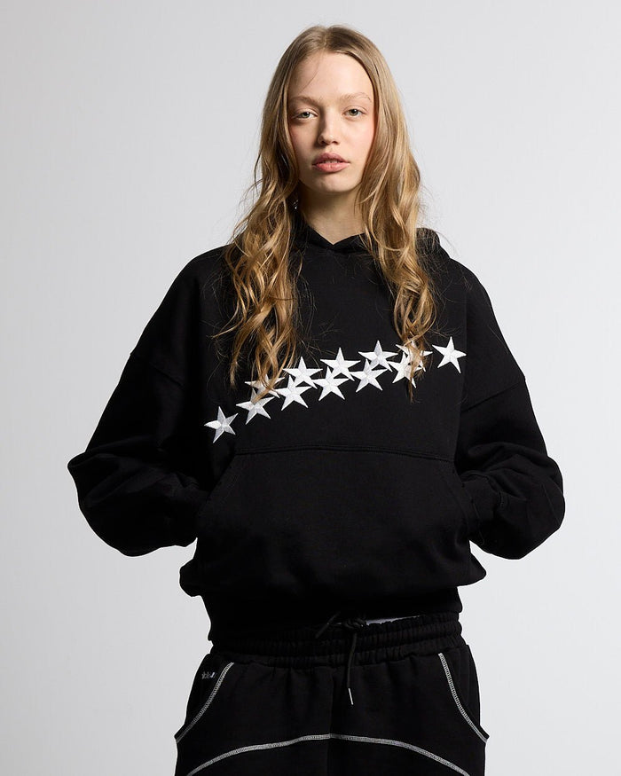 STARS HOODIE BLACK - black oversized hoodie, front view on female model - Cold Culture #woman