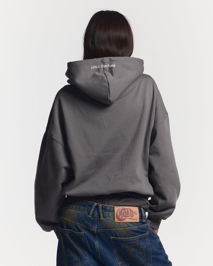 STARS HOODIE DUST GREY - dust grey oversized hoodie, back view on female model - Cold Culture #woman