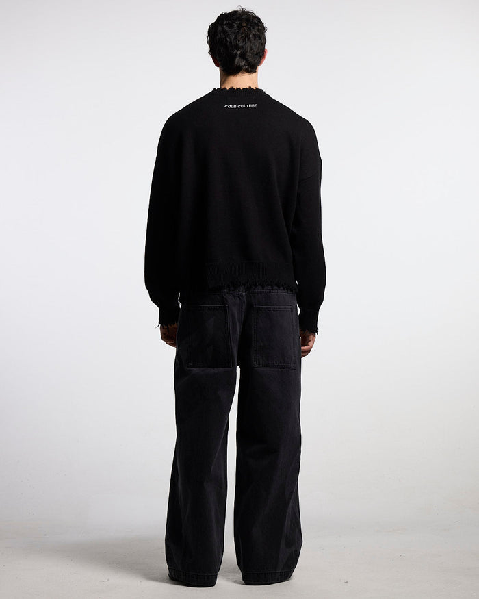 STARS KNIT BLACK - black distressed knit sweater, back view on male model - Cold Culture #man