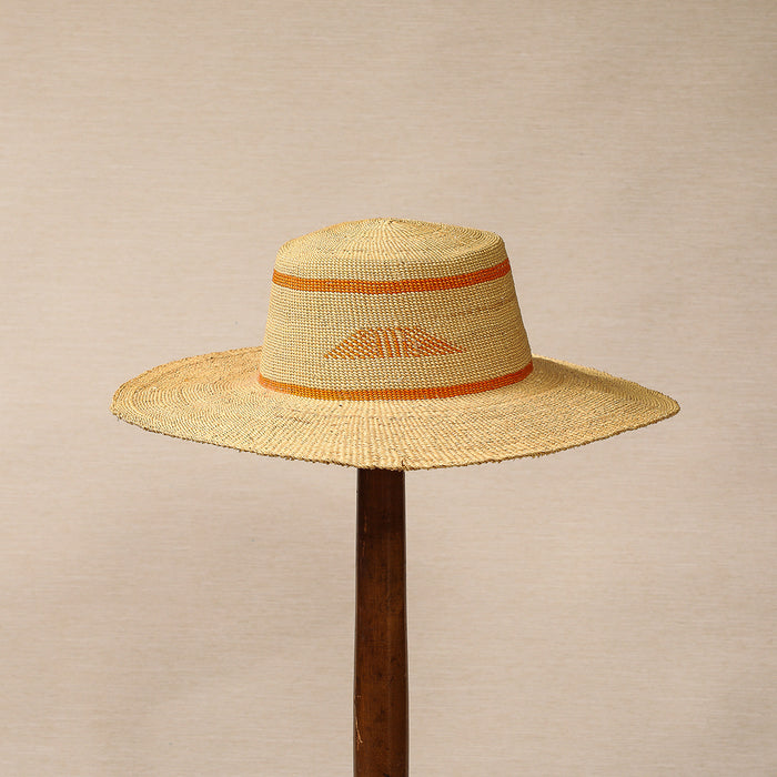 Straw hat with orange cartouche