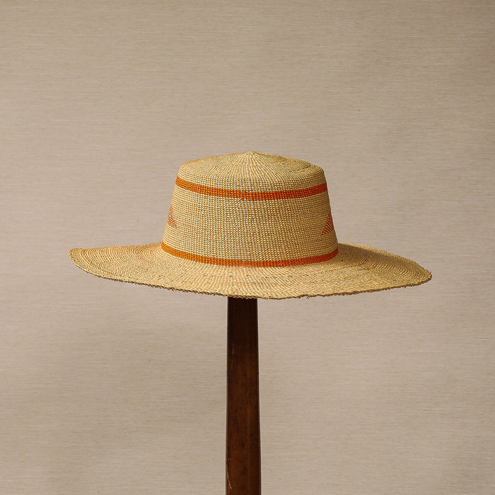 Straw hat with orange cartouche