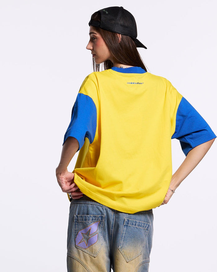 TEEN SPIRIT ERA TEE YELLOW AND BLUE - yellow and blue graphic print tee, back view on female model - Cold Culture #woman