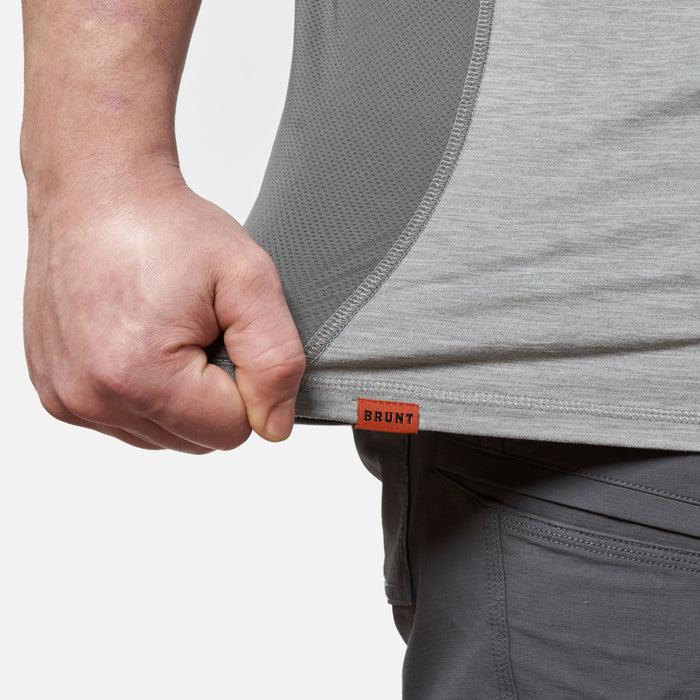 Stretching hemline of the BRUNT lightweight mckenna sun tee with UPF protection in grey heather