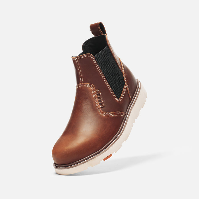 45 degree angle of the left BRUNT 6 inch water-resistant slip-on composite toe ohman work boot in tobacco